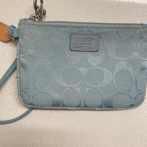 Coach light blew wristlet, great condition